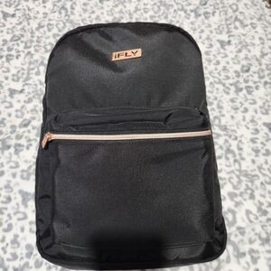Ifly Travel Backpack Black 18x11x5 Durable Fabric And Metallic Hardware.